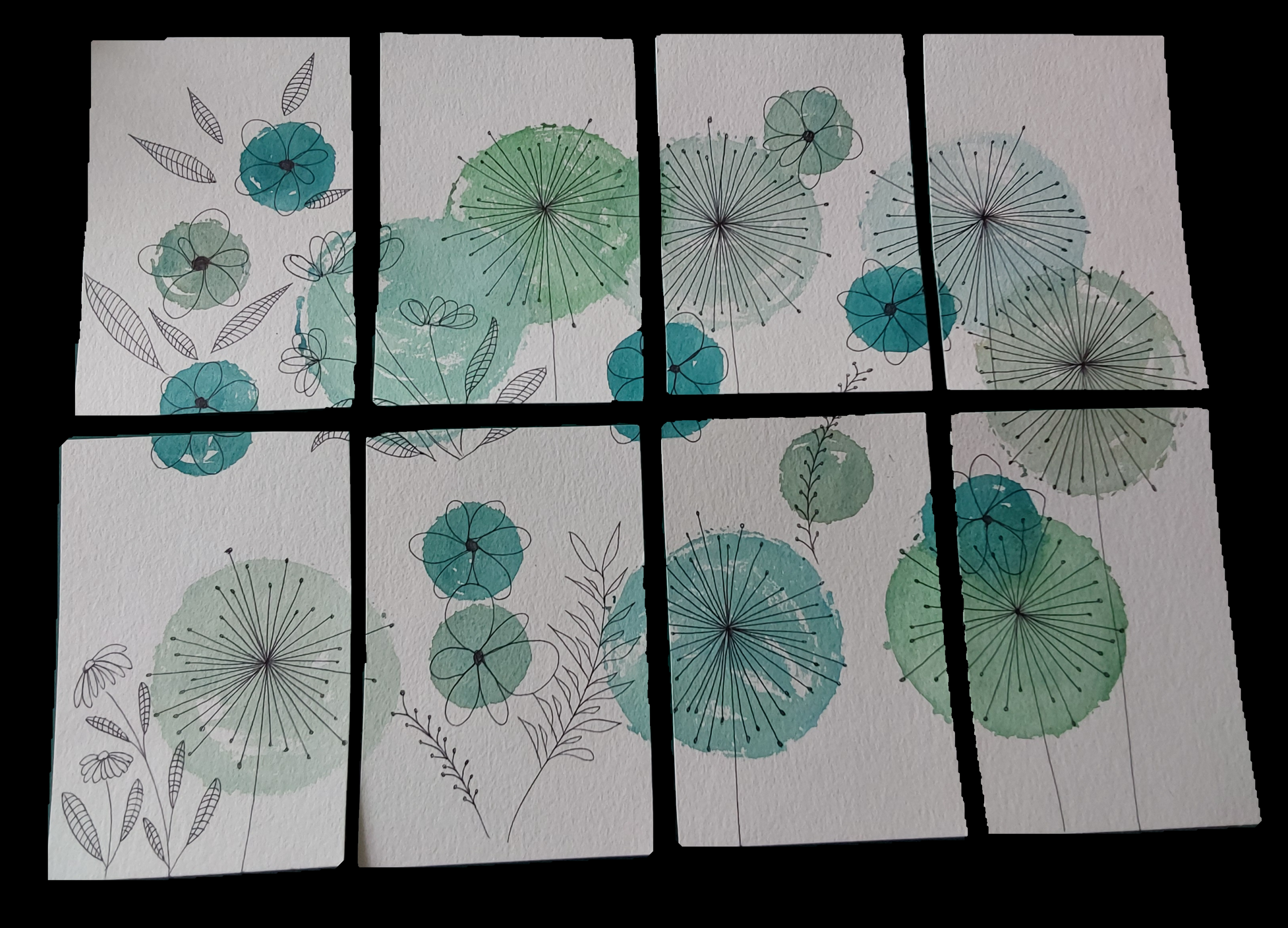 Lot de huit cartes postales avec un motif floral vert.