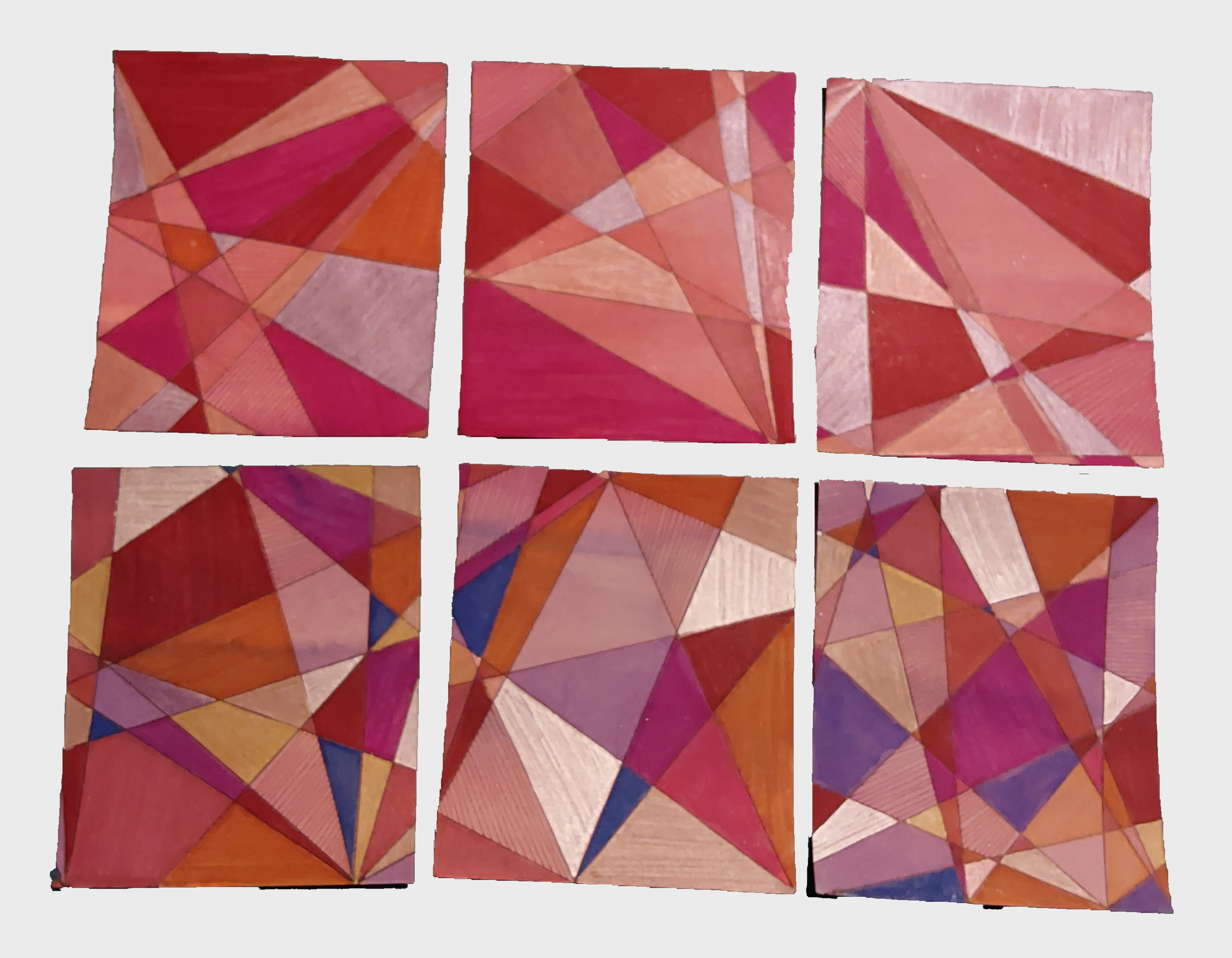 Lot de six cartes postales avec un motif géométrique rose.