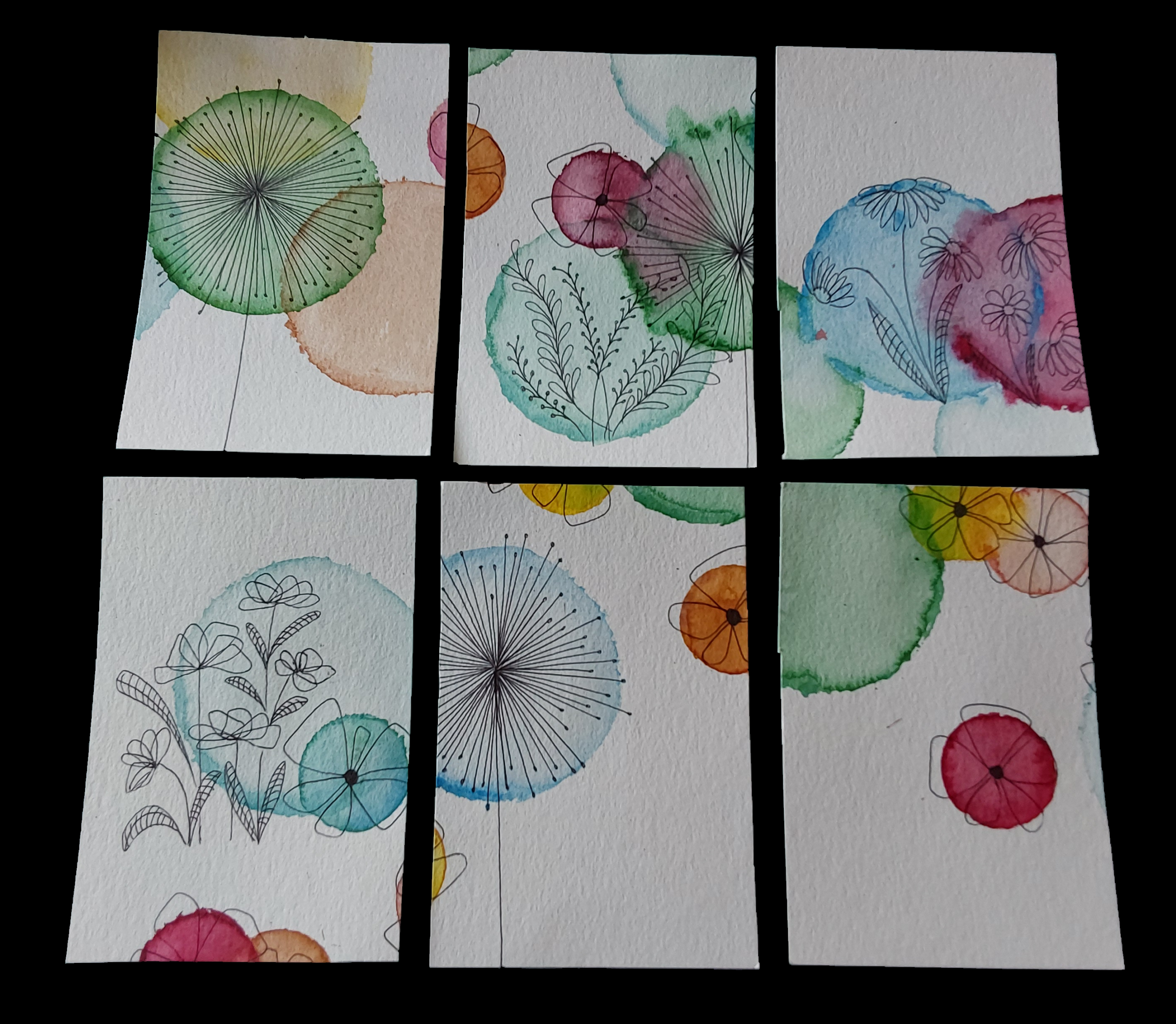 Lot de six cartes postales avec un motif floral.